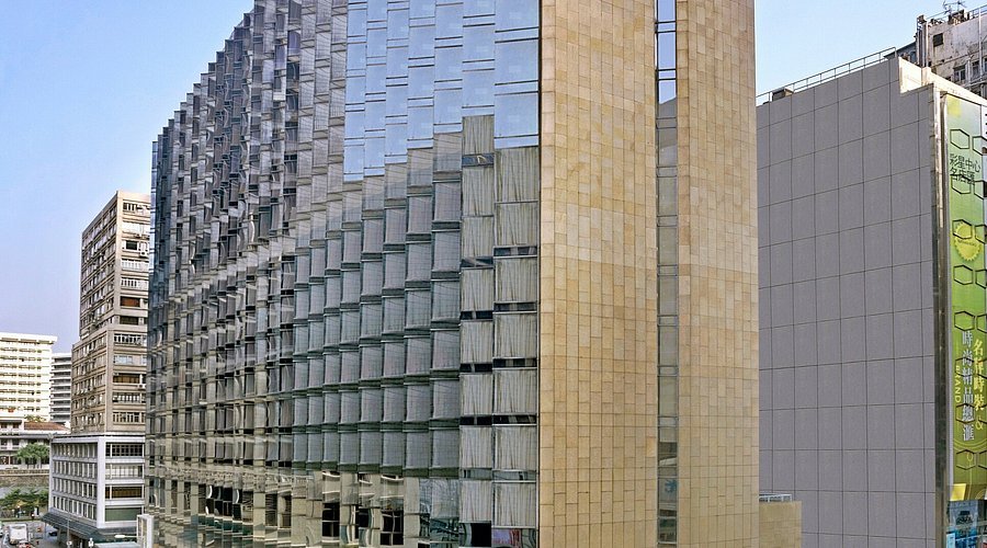 Kowloon Harbourfront Hotel exterior with Victoria Harbour view